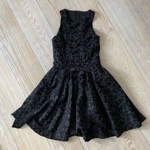 Banana Republic black textured cocktail dress with pockets